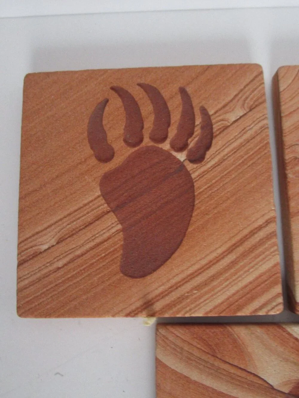 etched sandstone coaster set